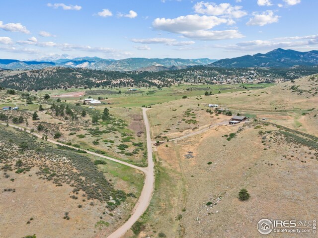 bird's eye view with a mountain view