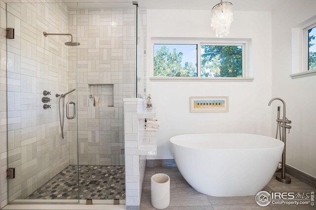 2870 18th St, Boulder, CO 80304 - bathroom featuring independent shower and bath and tile patterned flooring