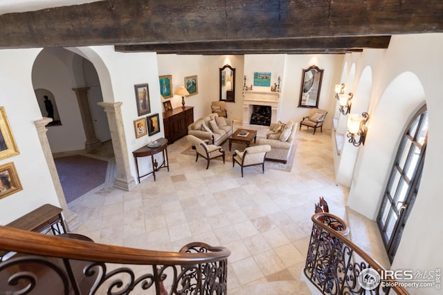 living room with ornate columns