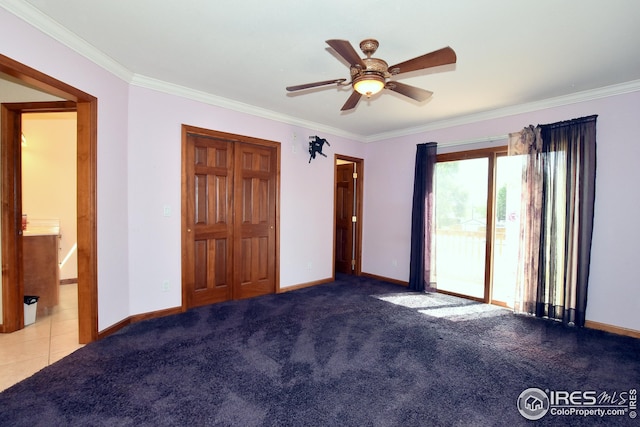 unfurnished bedroom featuring ensuite bathroom, ornamental molding, access to exterior, ceiling fan, and light carpet