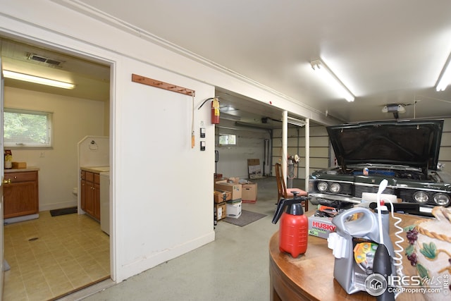 garage featuring a garage door opener