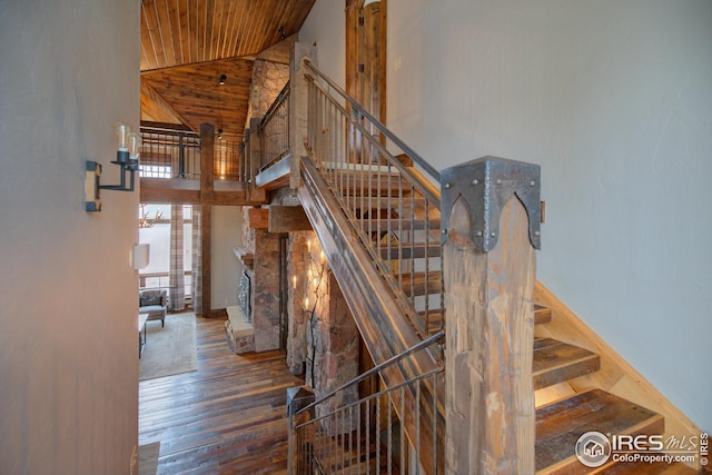 300 Samaia Ct, Tabernash, CO 80478 - stairs with wood ceiling, wood-type flooring, and high vaulted ceiling