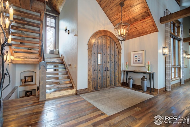 300 Samaia Ct, Tabernash, CO 80478 - foyer with a chandelier, wood-type flooring, stairway, high vaulted ceiling, and wooden ceiling