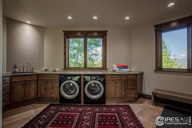 300 Samaia Ct, Tabernash, CO 80478 - clothes washing area featuring baseboards, separate washer and dryer, a sink, and recessed lighting