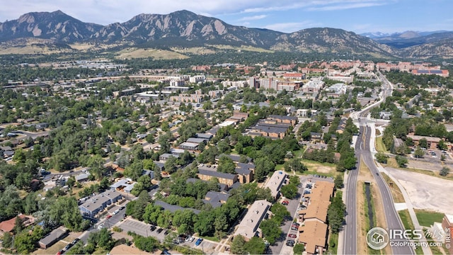 birds eye view of property with a mountain view