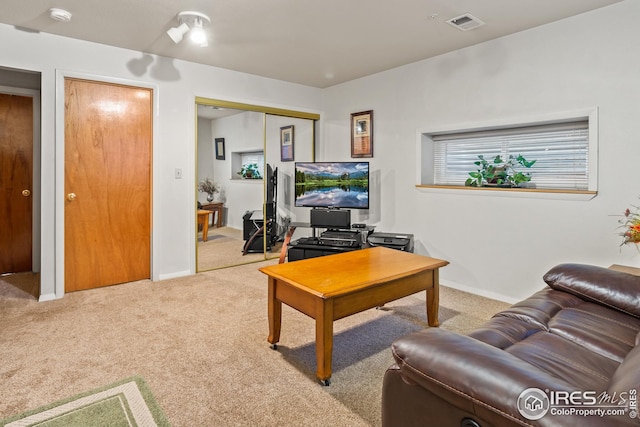 living room with light carpet