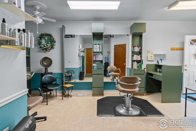 misc room with ceiling fan and light tile patterned floors