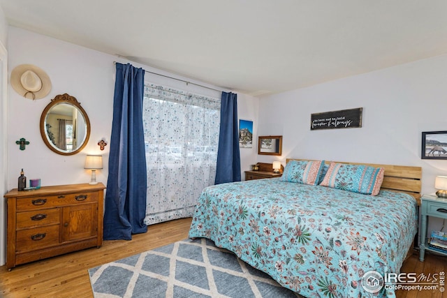 bedroom featuring light hardwood / wood-style floors