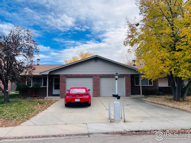 single story home with a garage