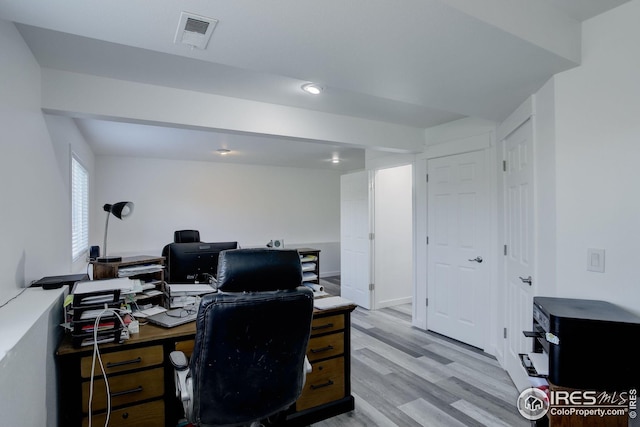 office space featuring light hardwood / wood-style floors