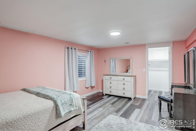 bedroom featuring light hardwood / wood-style floors