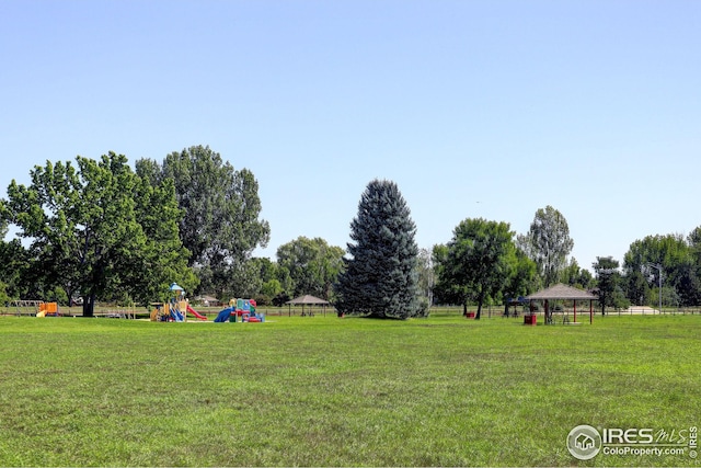 view of yard featuring a playground and a gazebo