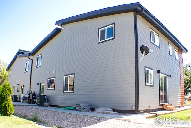 back of house featuring a patio