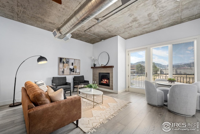 living room with light hardwood / wood-style flooring