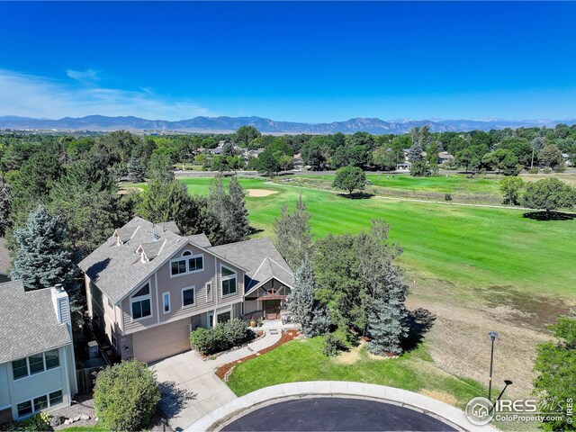 drone / aerial view featuring a mountain view