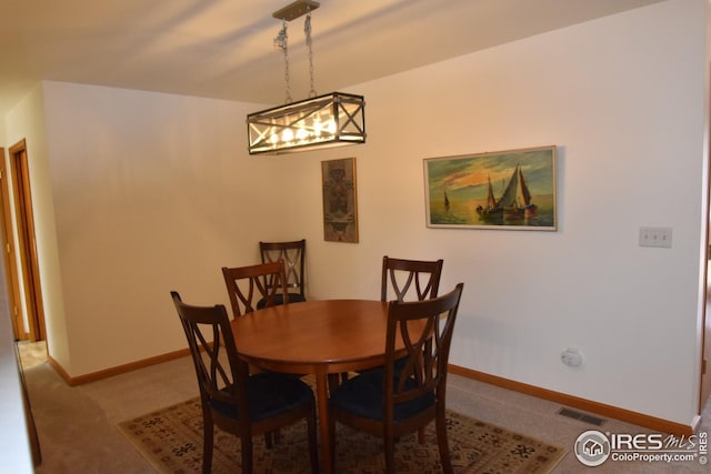 dining area with carpet floors