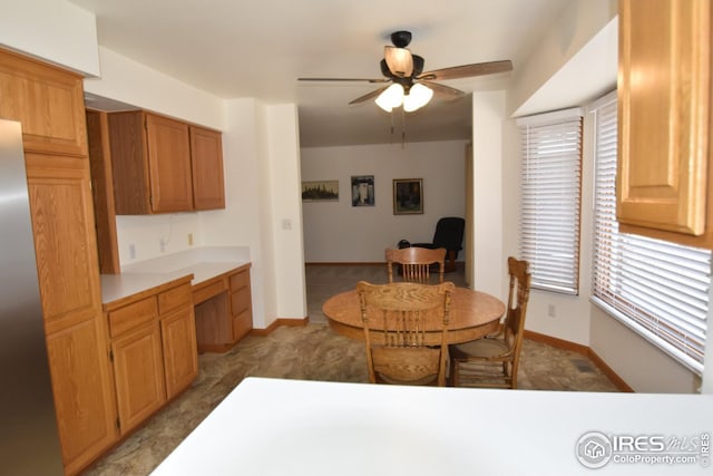 dining area with ceiling fan