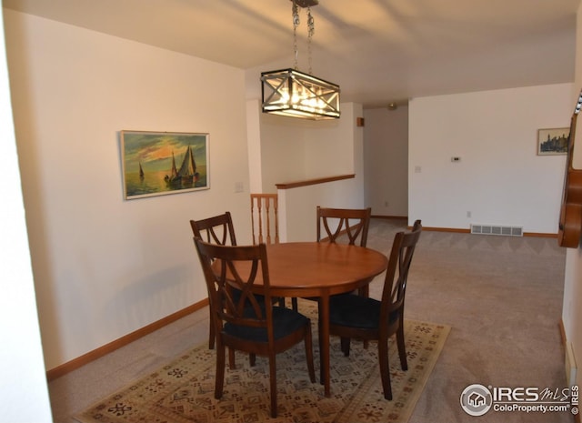 dining room with an inviting chandelier