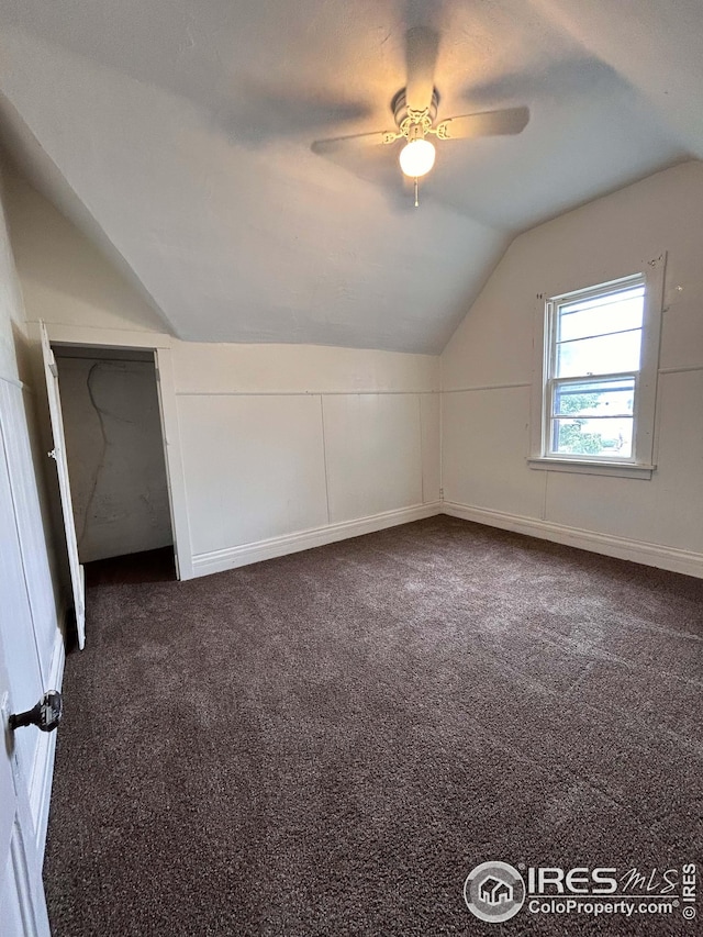 bonus room featuring carpet, lofted ceiling, and ceiling fan