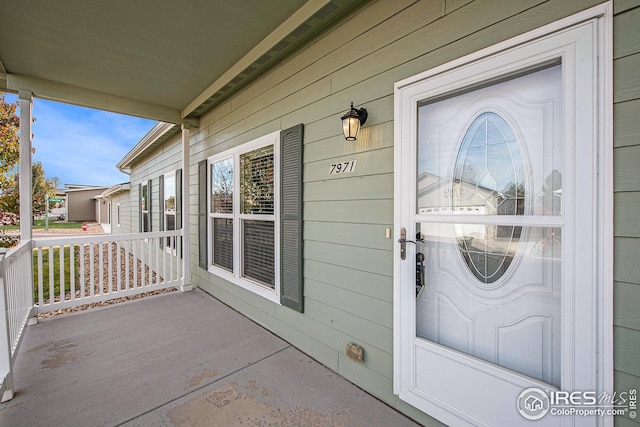 entrance to property with a porch