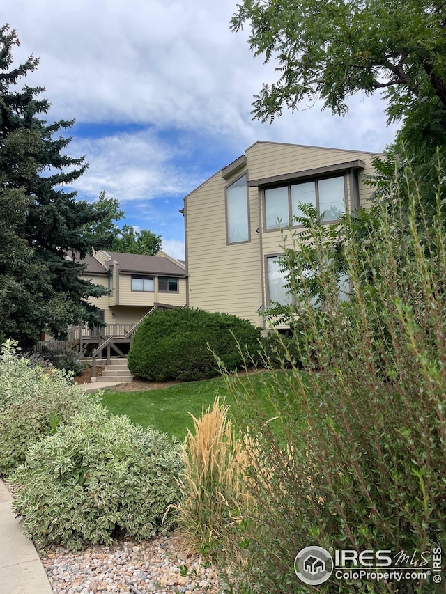 view of home's exterior featuring a yard