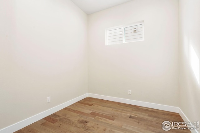 empty room featuring light hardwood / wood-style floors