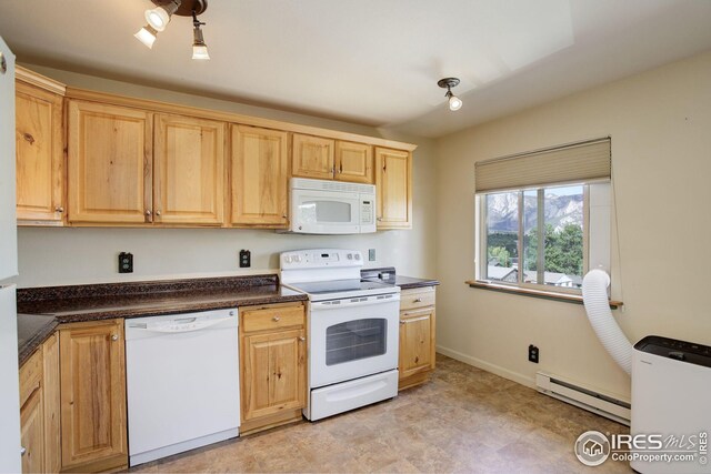 kitchen with white appliances, light brown cabinetry, and a baseboard radiator