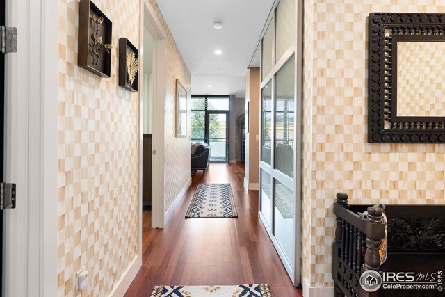 1155 Canyon Blvd Unit 205, Boulder, CO 80302 - corridor featuring tile walls, baseboards, dark wood-style floors, and recessed lighting