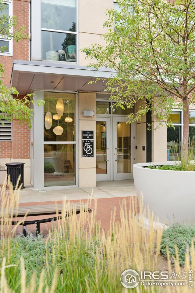 1155 Canyon Blvd Unit 205, Boulder, CO 80302 - doorway to property featuring stucco siding and french doors
