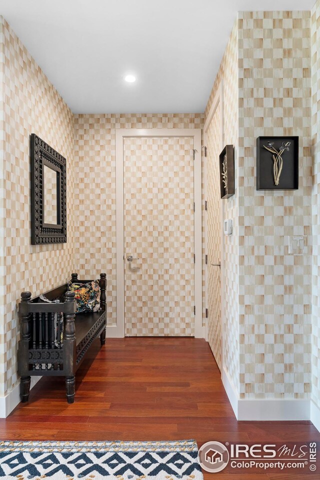 1155 Canyon Blvd Unit 205, Boulder, CO 80302 - hall featuring wallpapered walls, wood finished floors, and recessed lighting