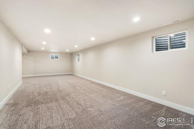 basement with carpet flooring