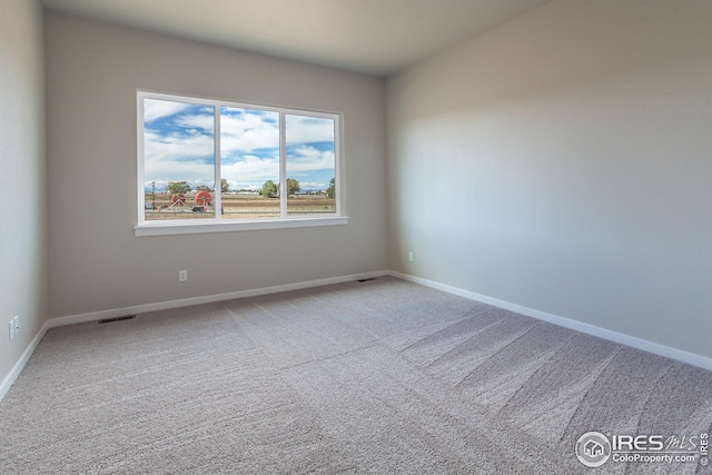 1215 105th Avenue Ct, Greeley, CO 80634 - carpeted empty room featuring baseboards and visible vents