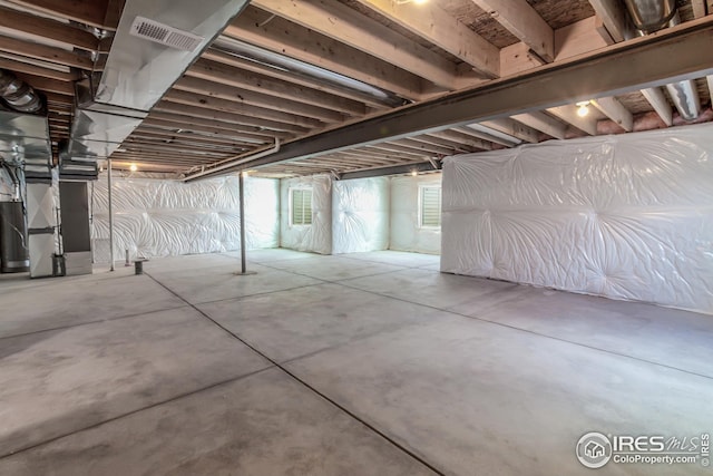 1215 105th Avenue Ct, Greeley, CO 80634 - below grade area with heating unit and visible vents