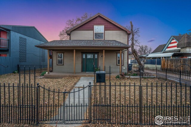 bungalow featuring a front yard and a porch