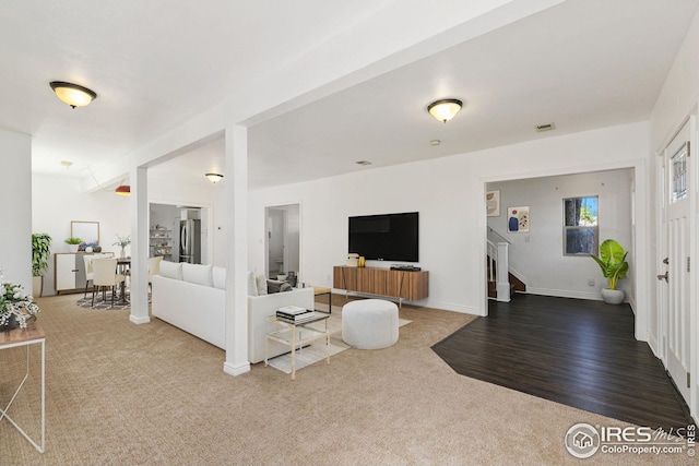 living room featuring carpet