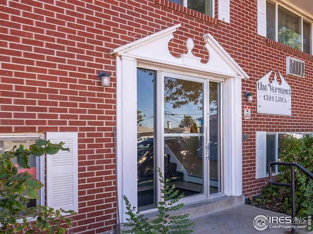 1391 Lima St, Aurora, CO 80010 - property entrance with brick siding