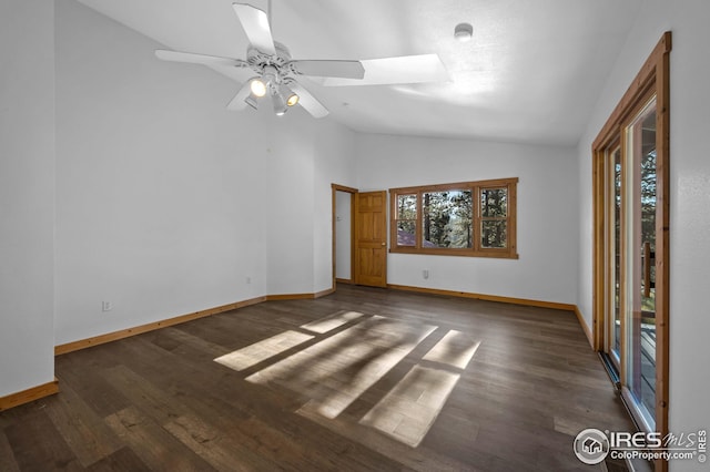unfurnished room featuring a ceiling fan, baseboards, wood finished floors, and lofted ceiling with skylight