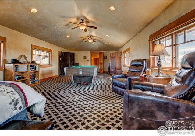 rec room with a healthy amount of sunlight, pool table, carpet flooring, and lofted ceiling