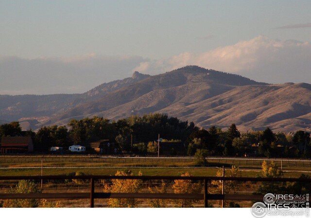 property view of mountains featuring a rural view