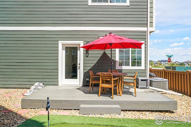 view of patio with a deck and central AC