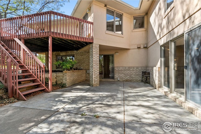 view of patio with a wooden deck