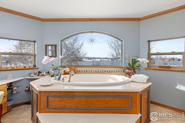 sitting room featuring light hardwood / wood-style flooring and a tiled fireplace