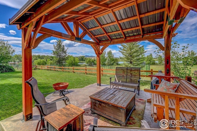 view of patio / terrace featuring a gazebo and a rural view