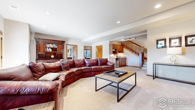 living room with light carpet