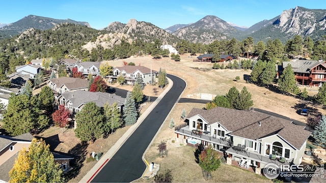 bird's eye view with a mountain view