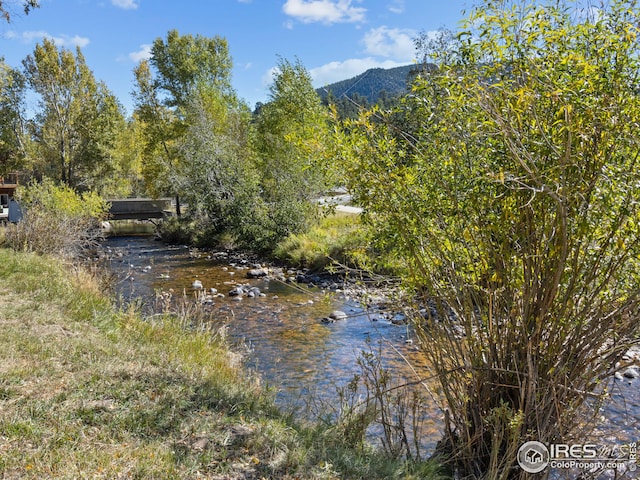 property view of water with a mountain view