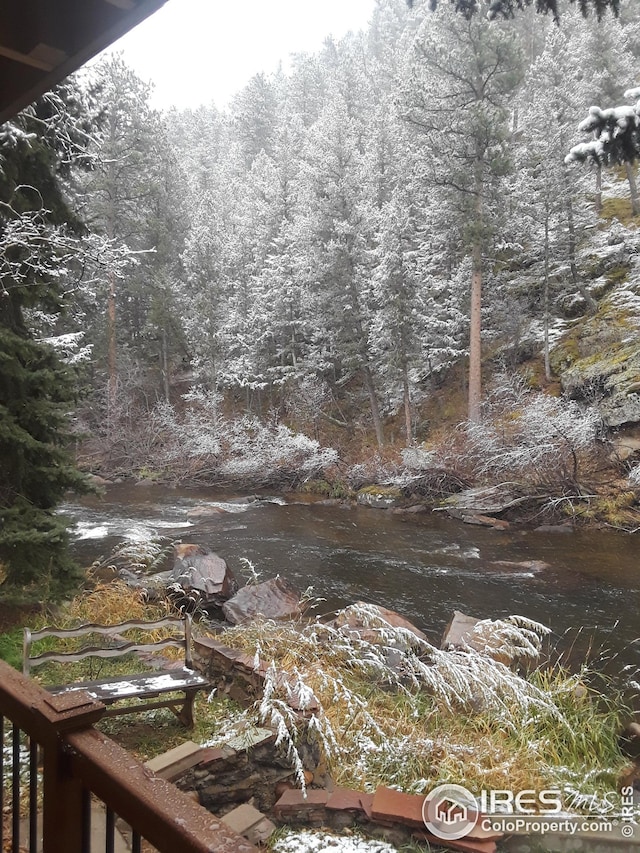 view of local wilderness with a view of trees