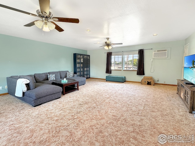 carpeted living room featuring an AC wall unit and ceiling fan