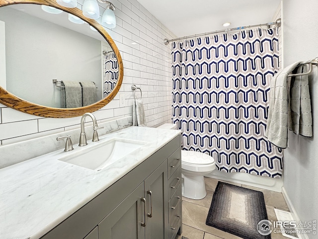 full bathroom with vanity, tasteful backsplash, shower / bath combination with curtain, tile patterned flooring, and toilet