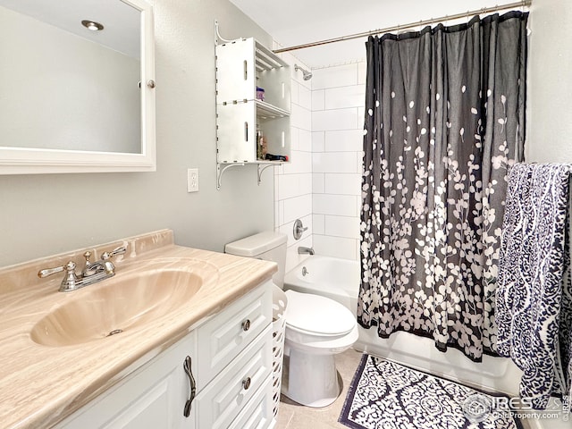 full bathroom featuring shower / bath combination with curtain, vanity, tile patterned flooring, and toilet